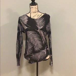 Black feather long sleeve shirt.